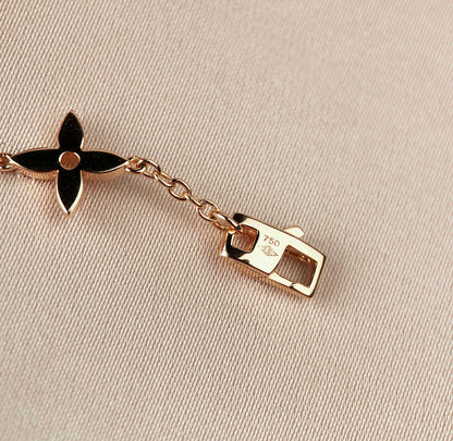 [エテルナジュエルズ]星と太陽の7モチーフ ゴールドブレスレット