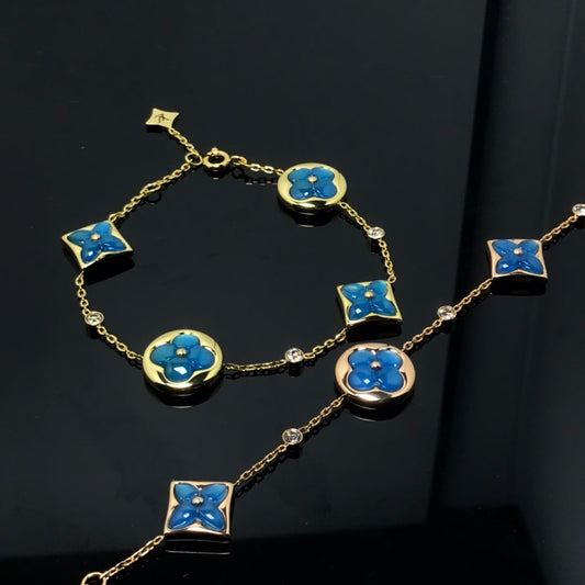 [Eterna Jewels]ARMBAND "STERNE UND SONNE" MIT 4 MOTIVEN, BLAU