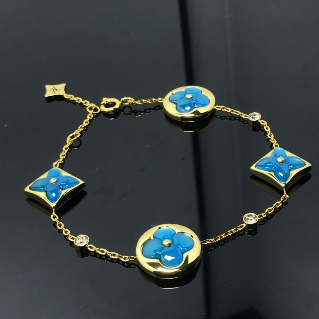 [エターナ ジュエルズ] スター＆サン 4モチーフ ブルーブレスレット